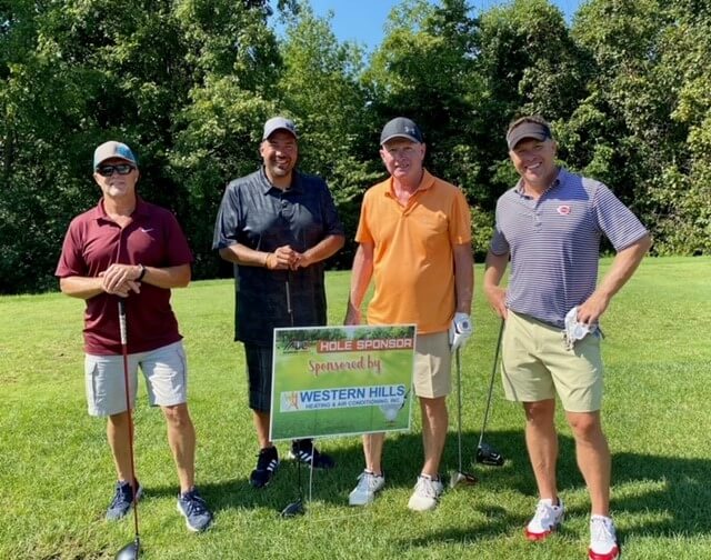 Western Hills Heating & Air Conditioning team day away golfing